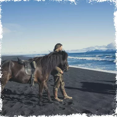 Mr Iceland at the Black Sand Beach with his horse